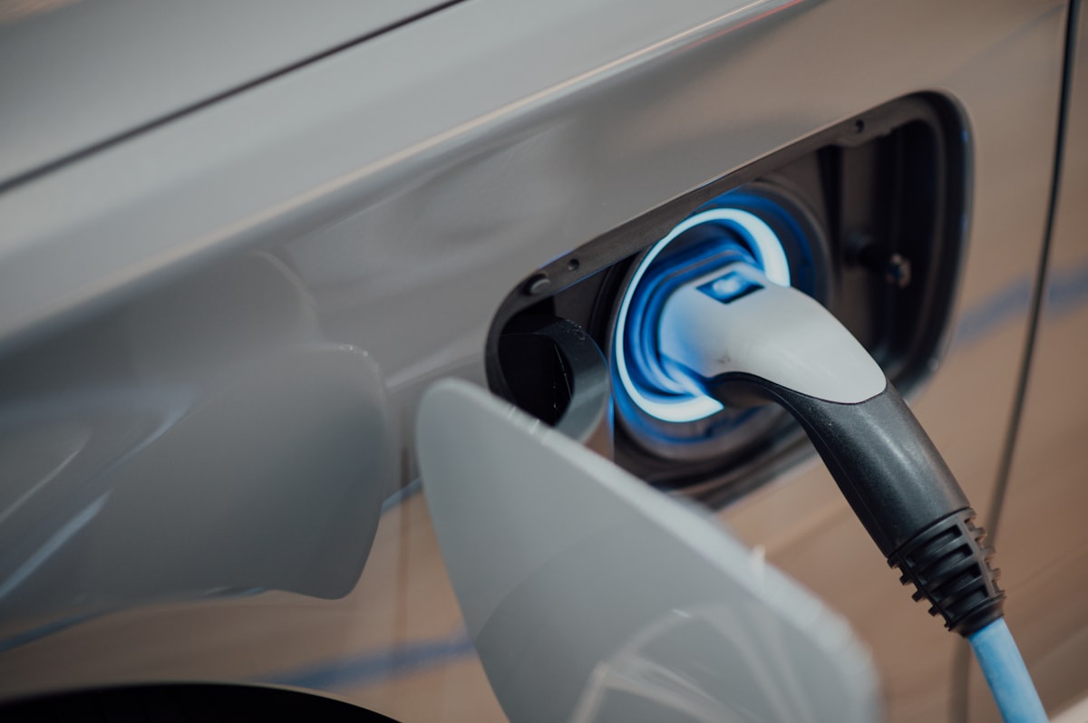 Auto electrical charging port with blue illumination