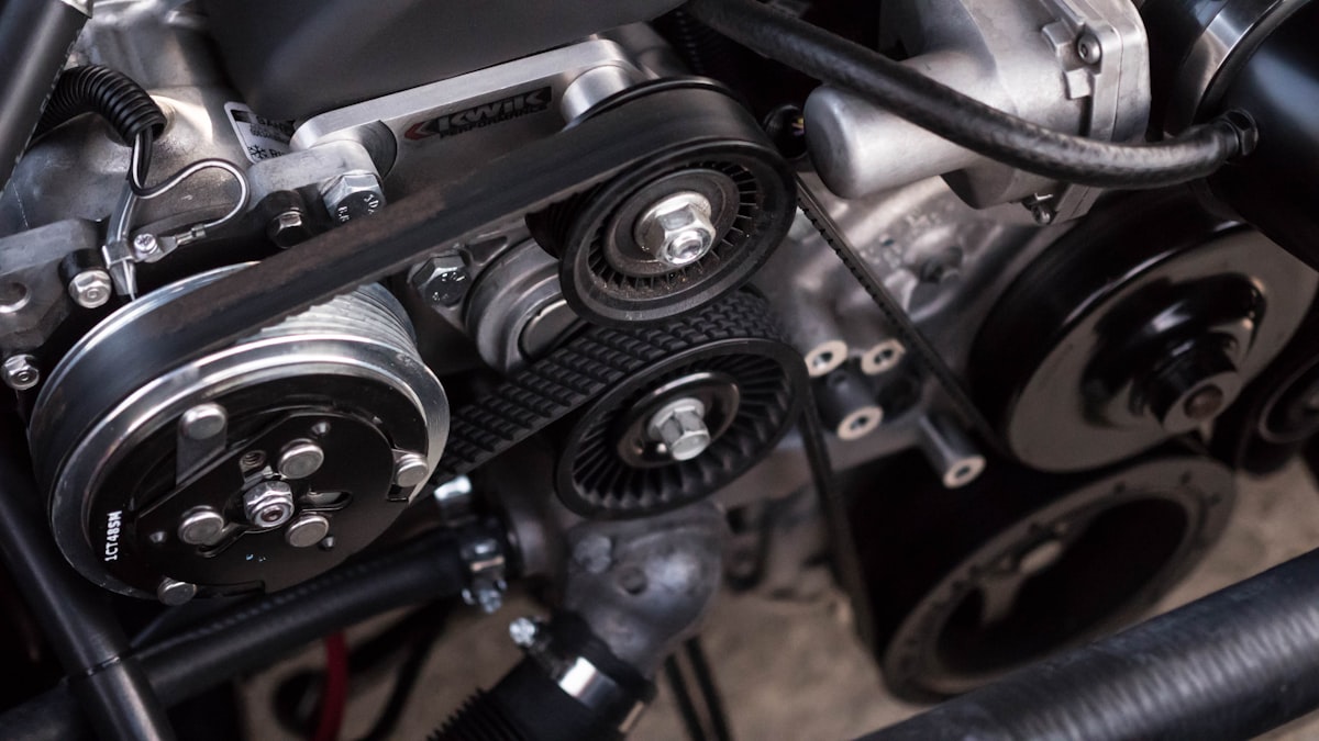 Transmission components and drive belts close up